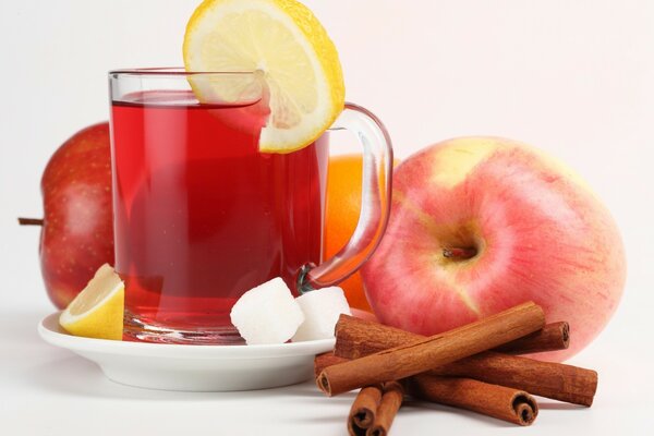 Tea with lemon cinnamon sugar and apple