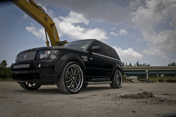 Tinted Range rover on the sky background