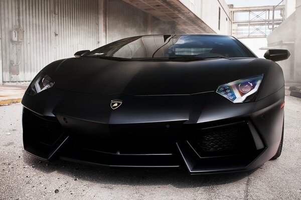 Lamborghini aventador LP700-4 black in the industrial zone