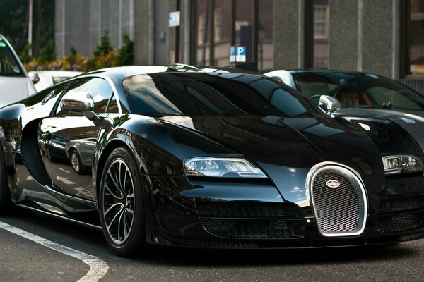 Bugatti sportif noir sur fond de ville