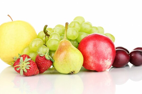 Fruits and berries on a white background