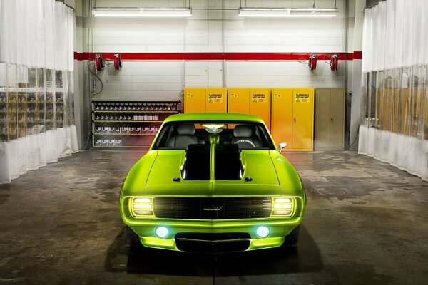 Beautiful art with Chevrolet camaro in the garage