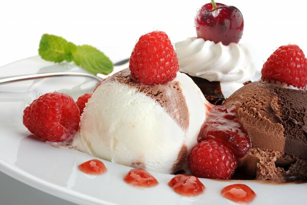 Ice cream with raspberries. Berry decoration