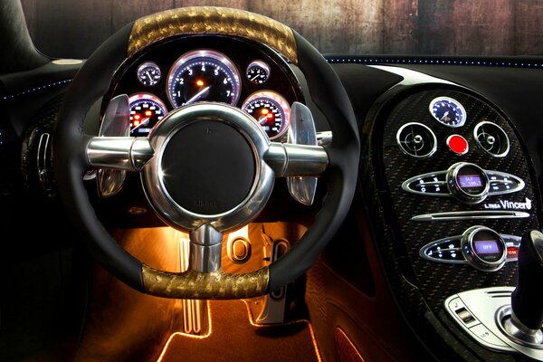 Designer steering wheel in the sports car interior
