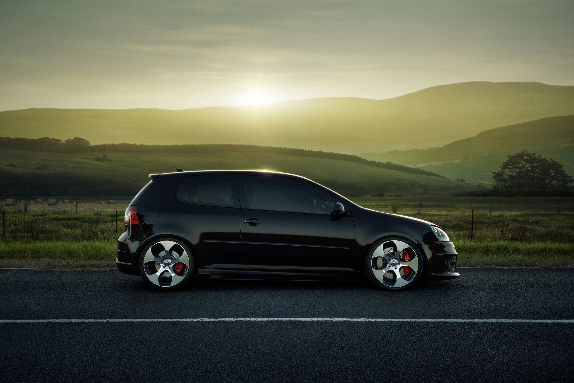 golf gti mkv volkswagen vw drives sideways road of the field