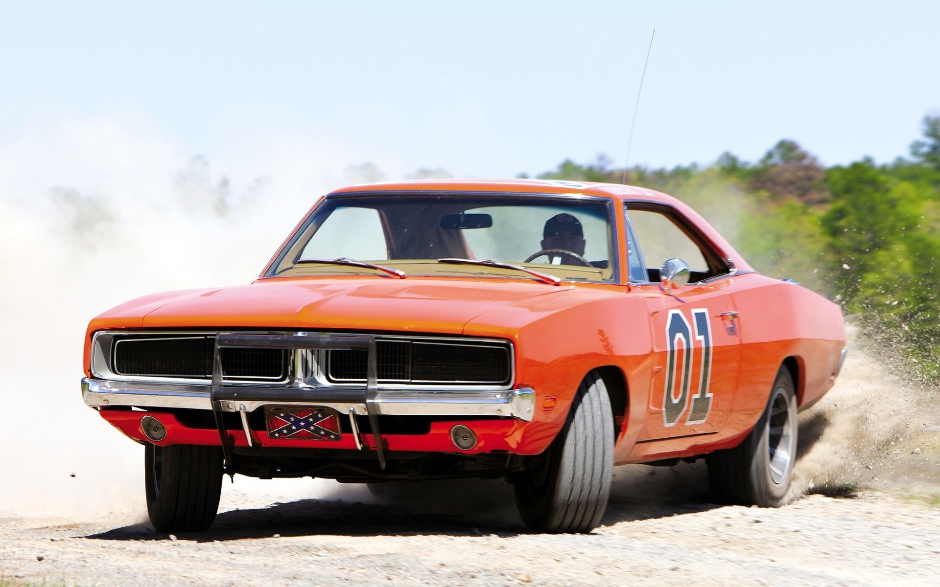 ausweichen ladegerät general lee 1969 dodge charger.general lee orange vorne.muscle car muscle car schleudern staub hintergrund