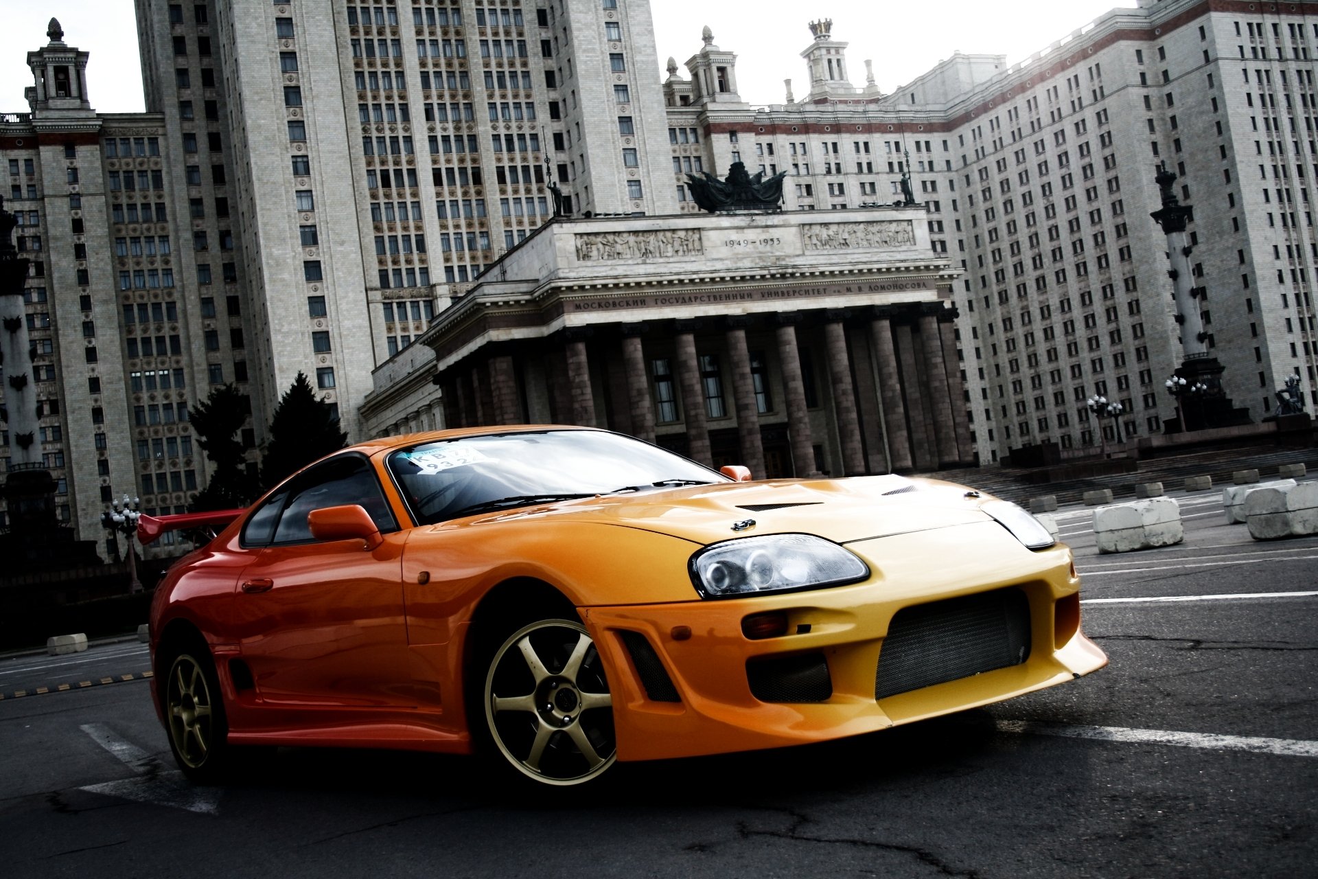 toyota sopra toyota supra auto sportiva arancione antenato messa a punto edificio msu sfondo