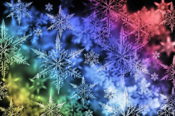 Copos de nieve de invierno en una ventana congelada