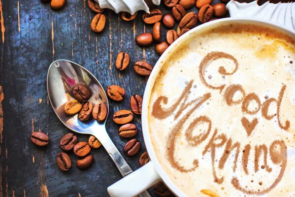 Inscription de mousse de café dans la tasse