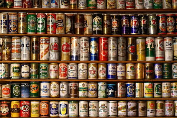 A rack with beer cans. Variety of choices