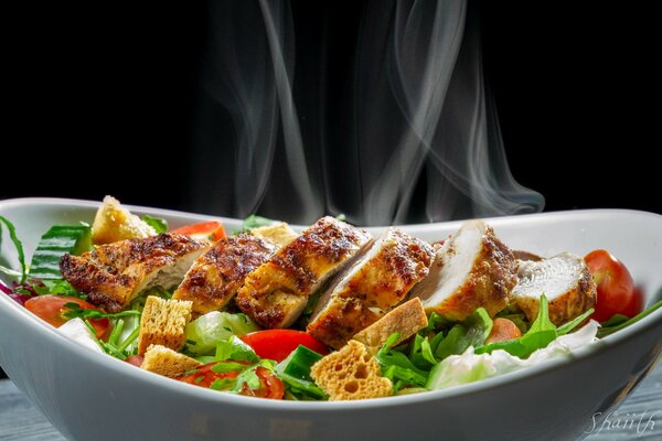 Beautiful salad with hot chicken