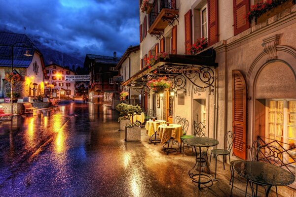 Swiss street with cafes and tables