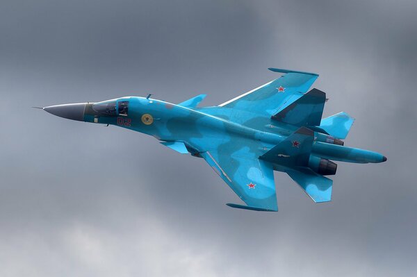 Su-34 bomber on a gray sky background