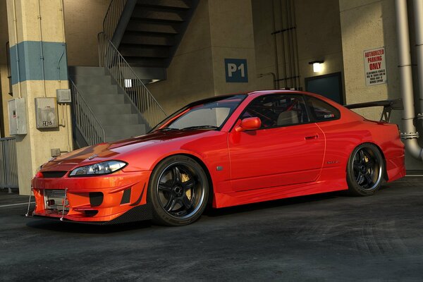 Voiture rouge Nissan Sylvia sur le parking