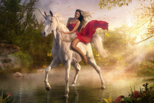 A girl riding a white unicorn