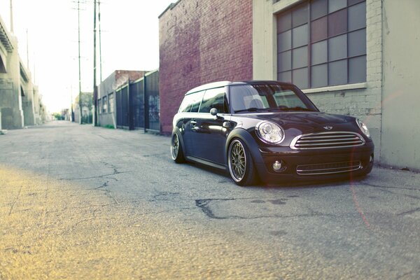 Parked black mini cooper