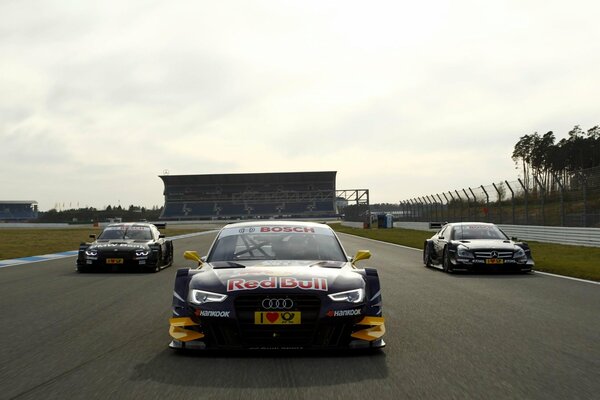 Motorsport. Races. On the highway Audi, Mercedes and BMW