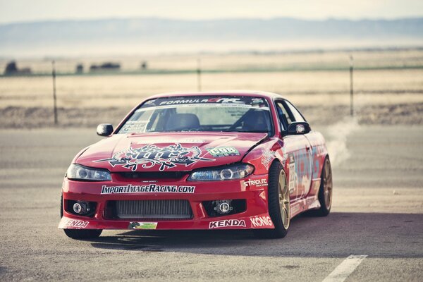 Nissan Silvia S15 rosso in adesivi Rally