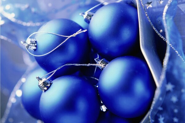 Christmas balls and toys decorate the Christmas tree