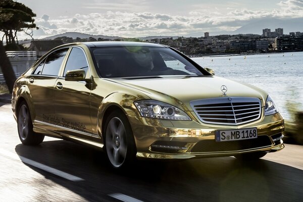 Golden rich chief on the road mercedes