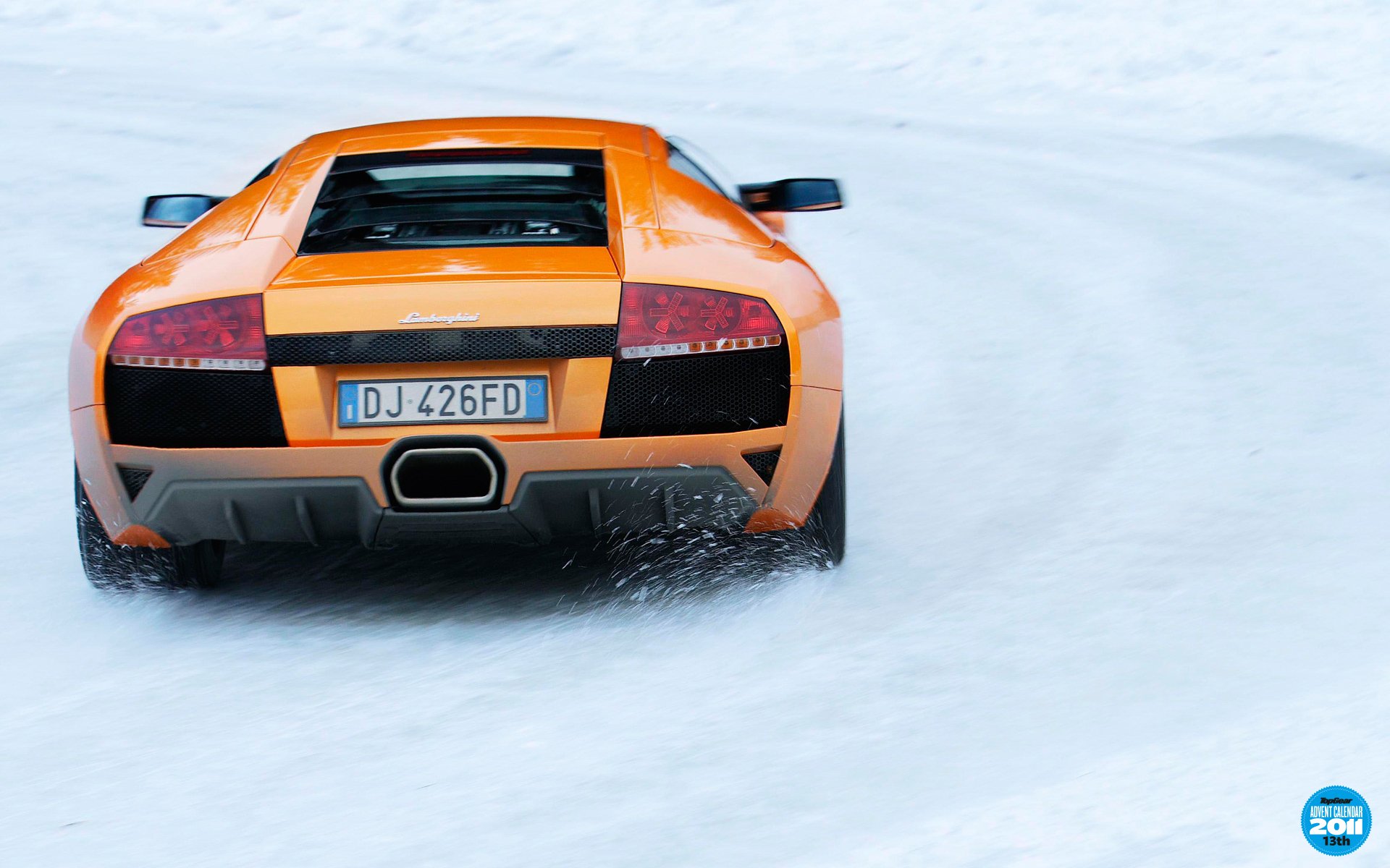 top gear calendario dell avvento 13td top gear marcia più alta lamborghini murcielago lamborghini marcelago supercar vista posteriore arancione strada inverno neve