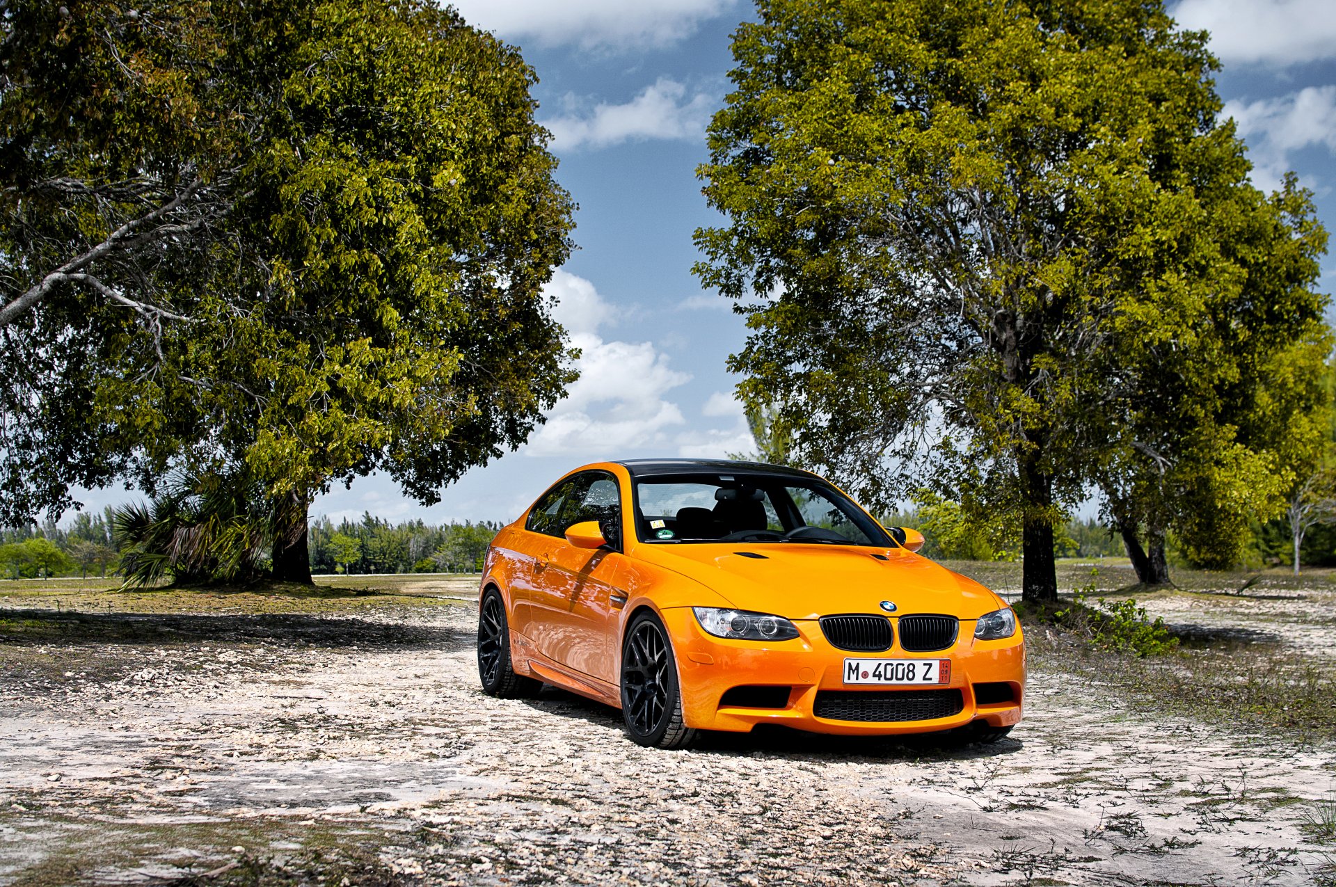 bmw m3 e92 arancione bmw alberi cielo nuvole