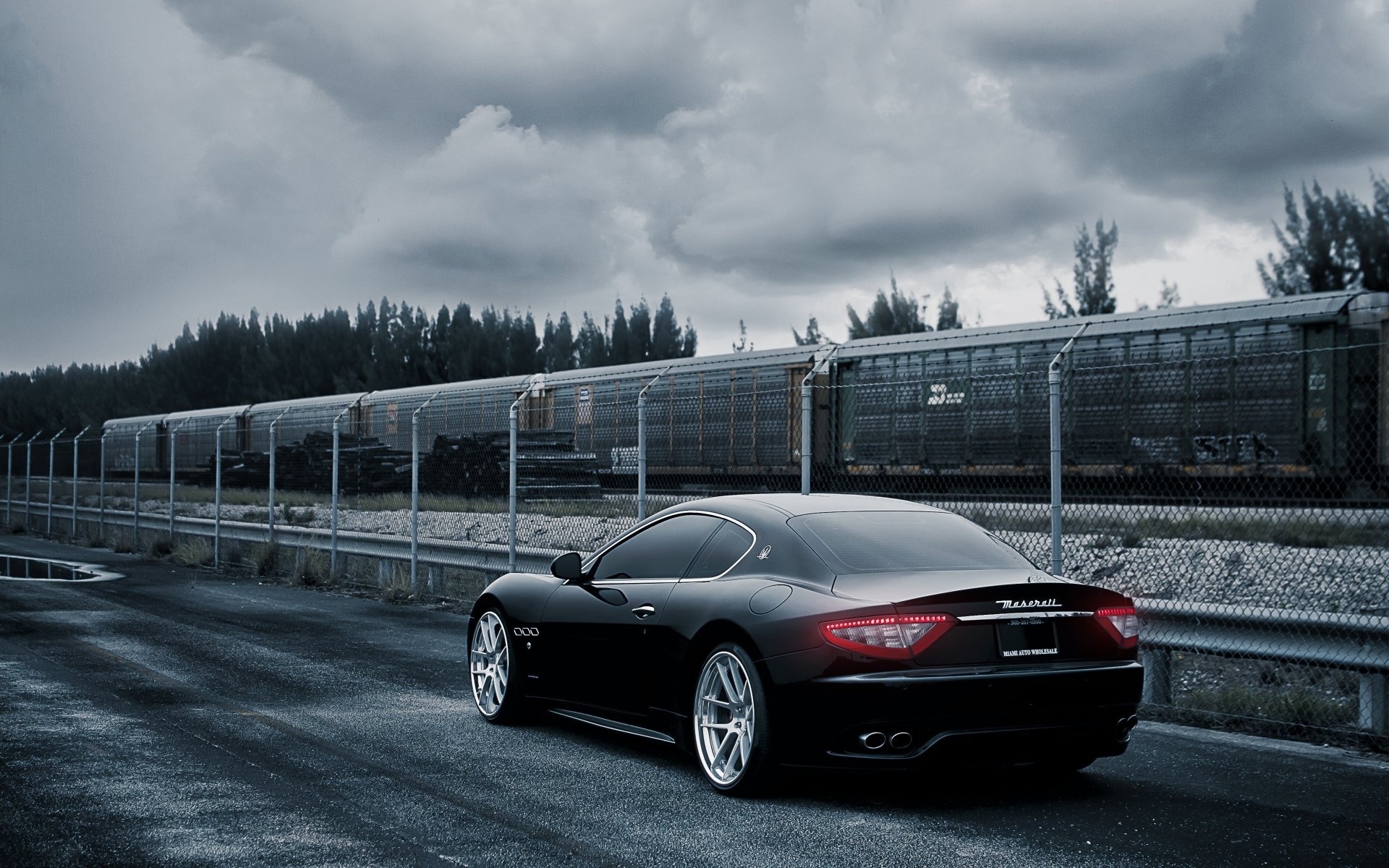 maserati gran turismo maserati gran turismo rear view sports car tuning rims fence train sky