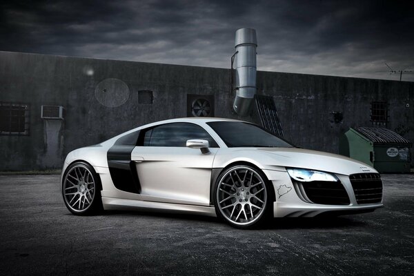 Audi r8. Coche blanco sobre un fondo gris oscuro