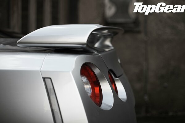 Silver car spoiler. Rear view