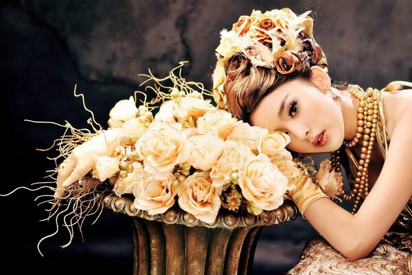 Asian girl with a big bouquet of roses