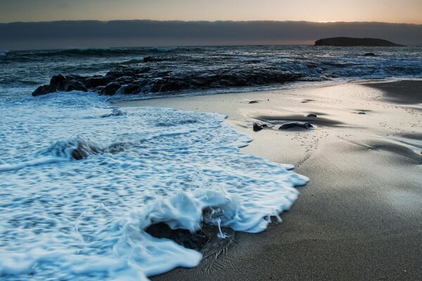 Waves on the sea at night