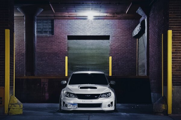 Subaru impreza on a cool background with phonoremsupersky