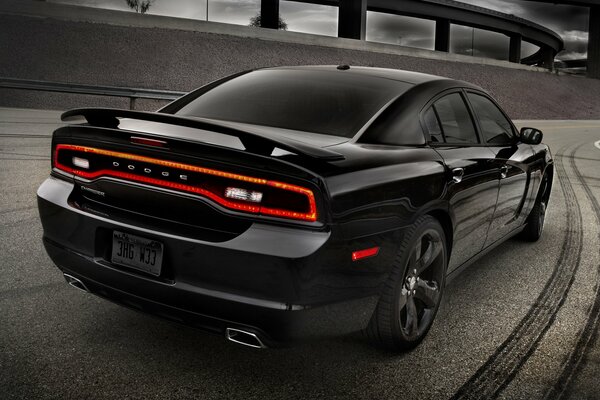 Black Dodge charger on estocade