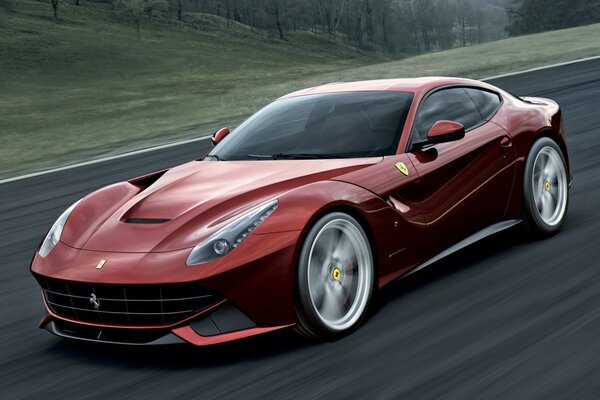 Nimble ferrari rushes along the track