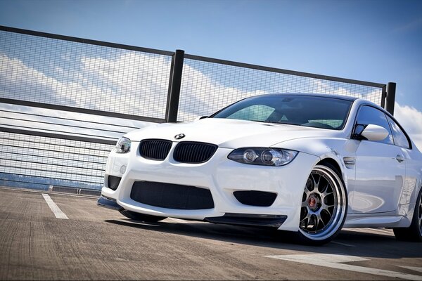 White bmw m3 Coupe car with low profile tires