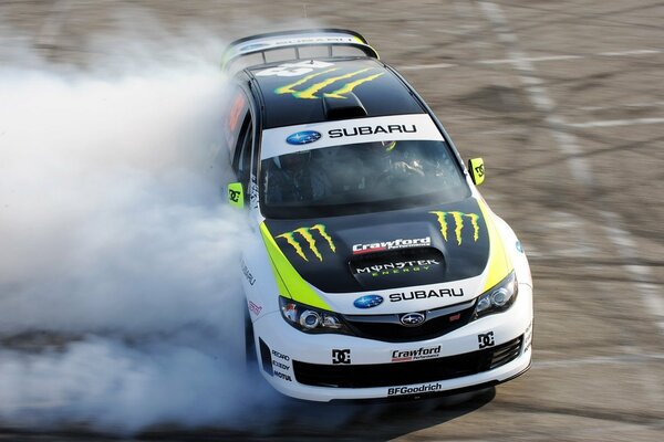 Sporty tuned subaru drifts on the highway