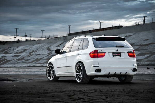 White BMW crossover rear view