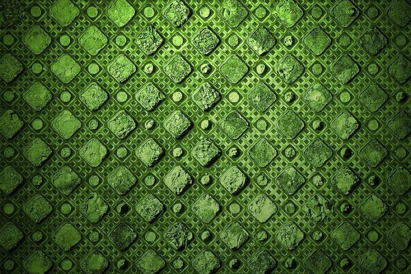 Textura de piedras con grietas sobre fondo verde