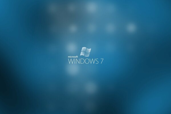 Niebieskie tło wygaszacza ekranu na komputerze z systemem Windows 7