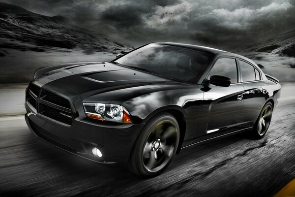 Dodge charger black rides on the road