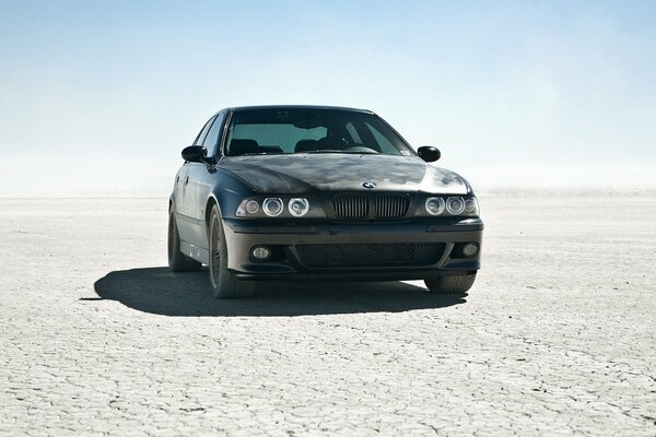 Cool black car in the desert