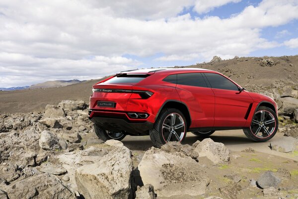 Red car in the mountain range