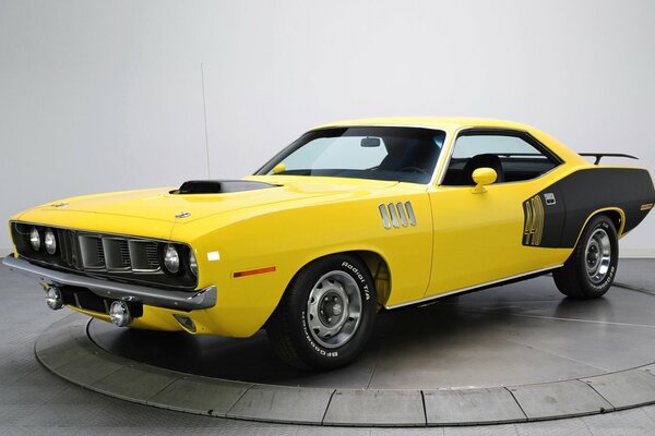 Yellow and black oil car Plymouth 1971