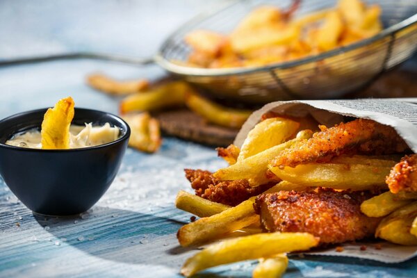 Deep-fried potatoes and sprinkled with salt