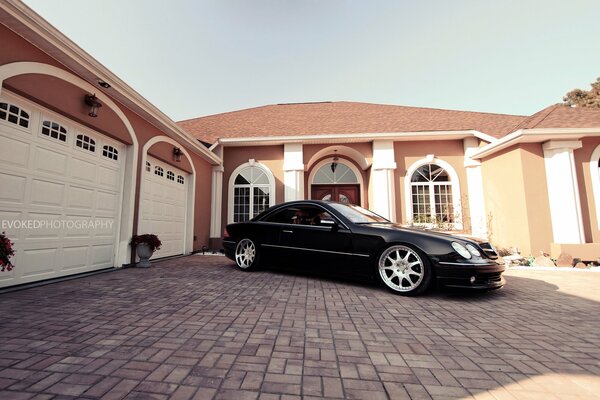 Mercedes black and mansion , fine