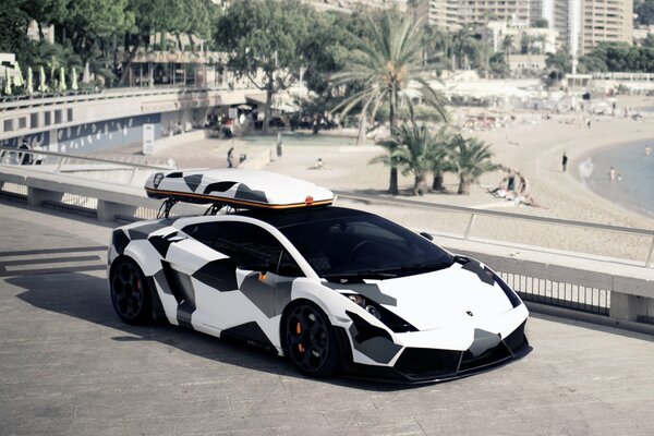 Camouflage Lamborghini gallardo on the beach