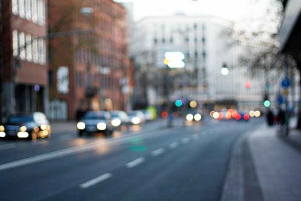 Blurry city photo with cars