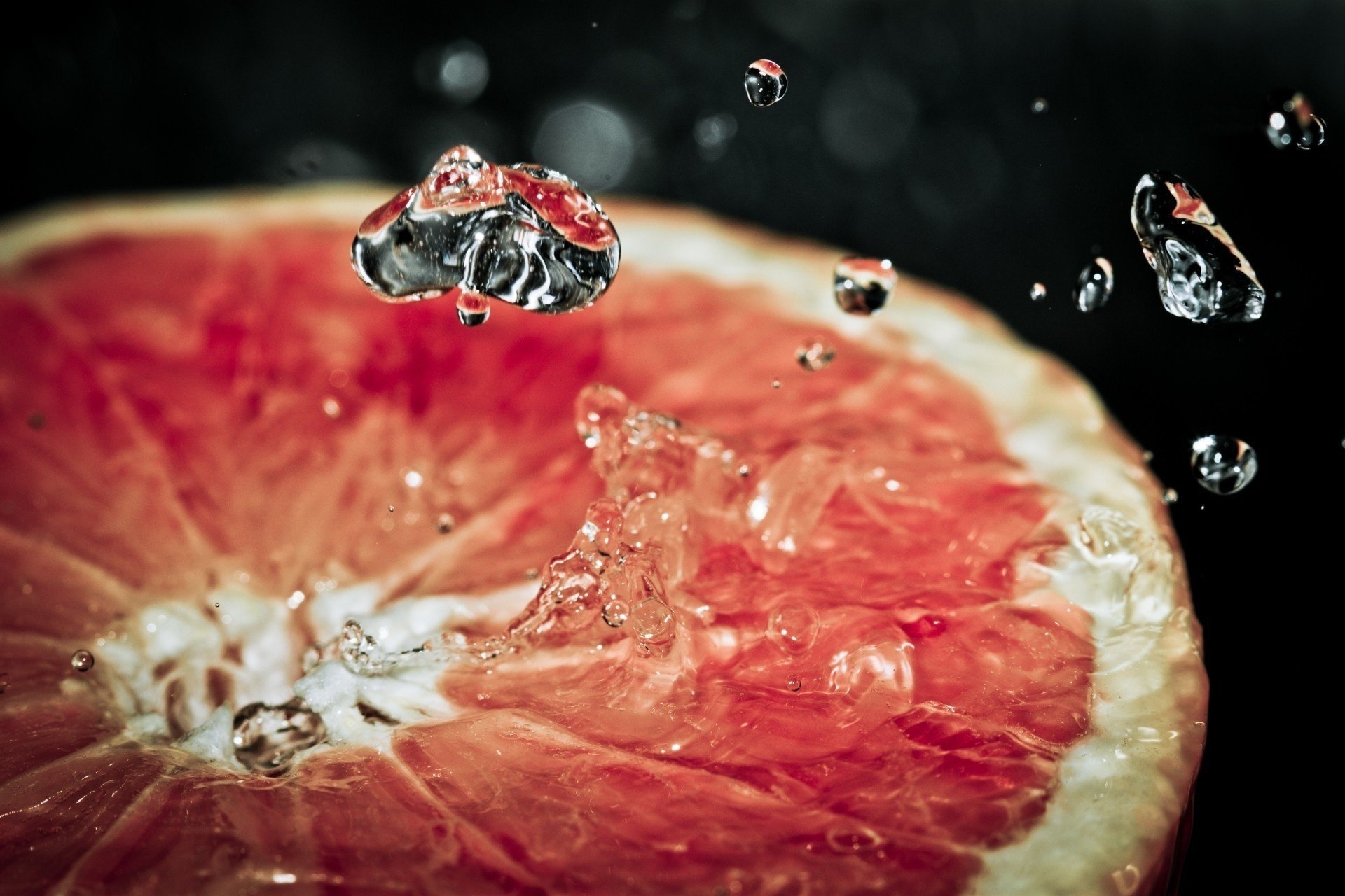 gotas macro pomelo salpicaduras agua cítricos