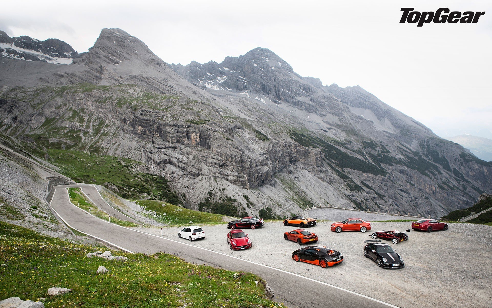 top gear supercar montagna strada porsche 911 gt3 rs bugatti veyron super sport ariel atomo jaguar xk-rs bmw m1 mclaren mp4-12c pagani zonda r ferrari in poi ford mustang boss 302 laguna seca volkswagen golf r