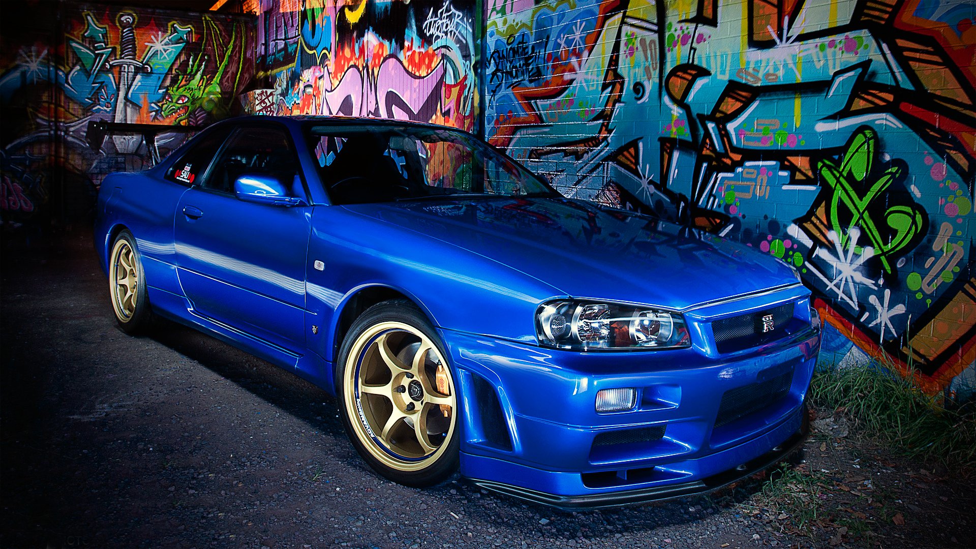 nissan skyline r34 niebieski nissan skyline graffiti